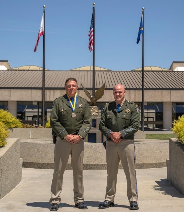 Officer Rogers with Commissioner Duryee